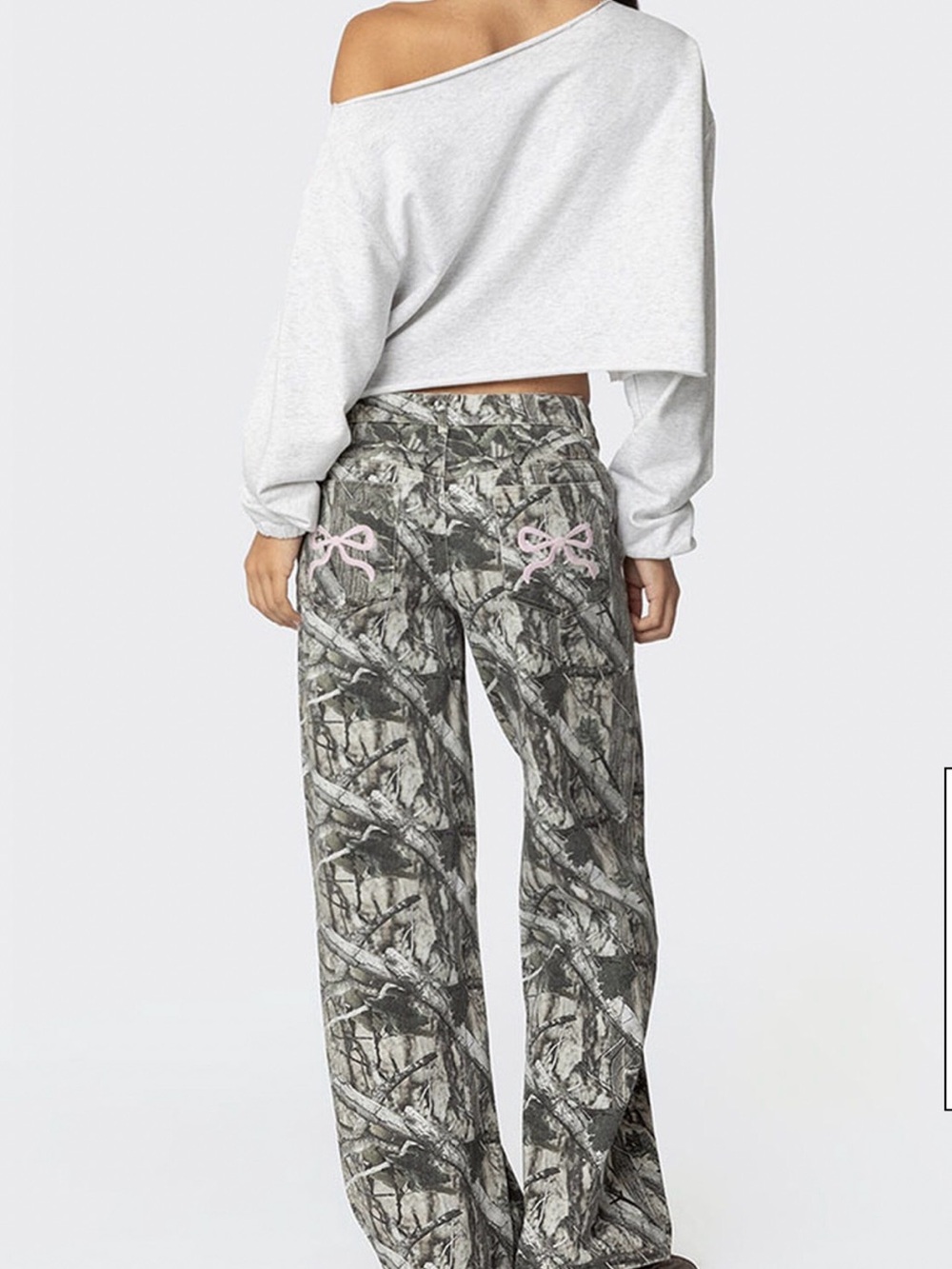 Edikted Camo & Bow Low Rise Jeans. Size small